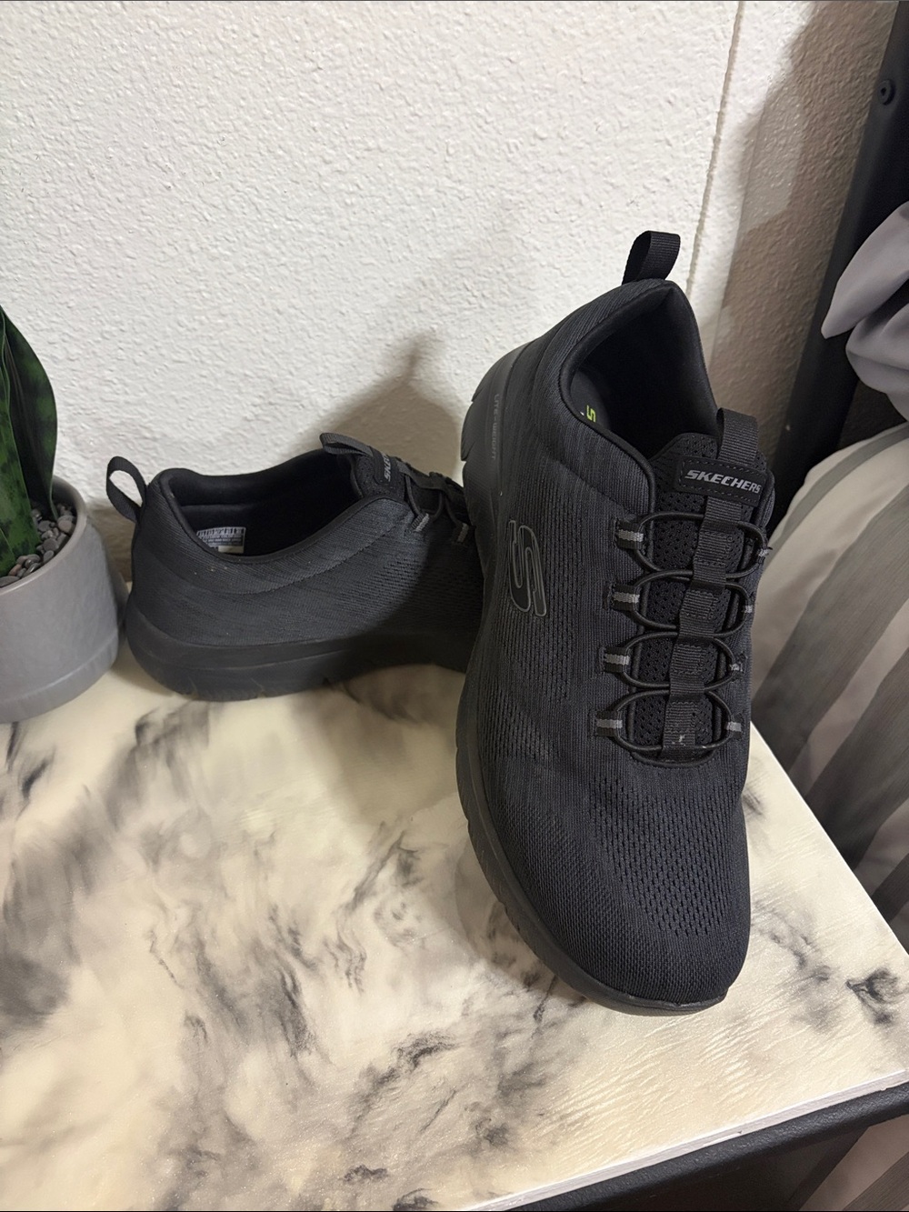 Skechers Men's All-Black Slip-On Athletic Sneakers